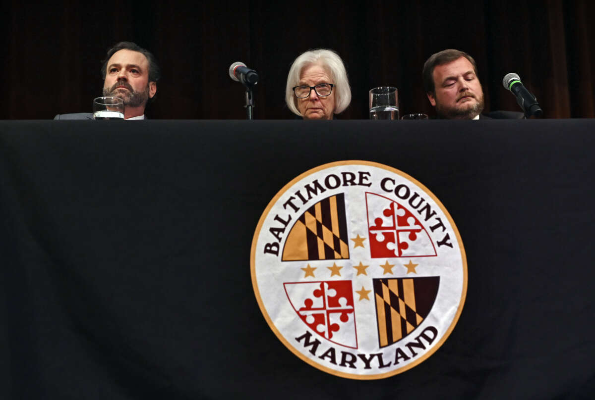 Baltimore County Executive Katherine Klausmeier (center) attends a District 1 Budget Town Hall meeting with Budget Director Kevin Reed (left) and Councilman Pat Young (right) at CCBC Catonsville, in Catonsville, Maryland.