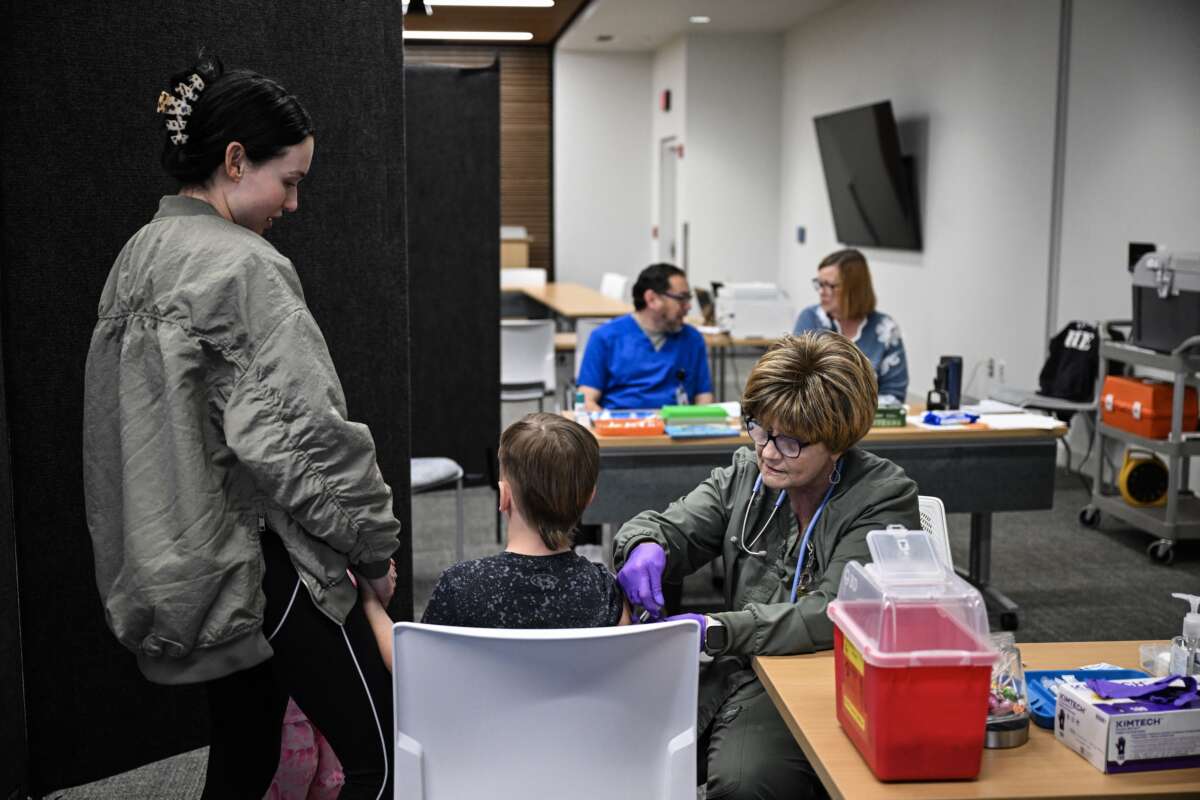 A medical staffer administers a dose of the measles vaccine to a child at a health center in Lubbock, Texas, on February 27, 2025.