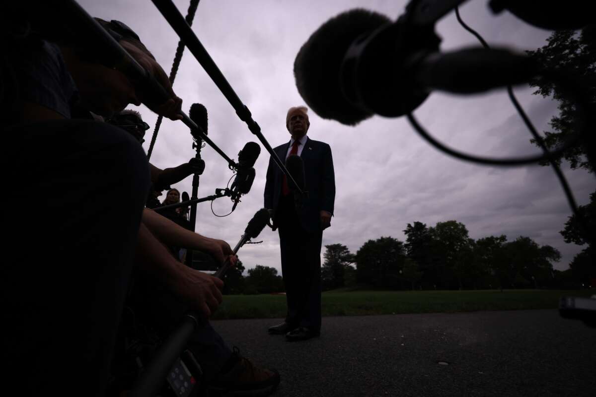 Donald Trump speaks to the media as he departs the White House on August 1, 2025, in Washington, D.C.