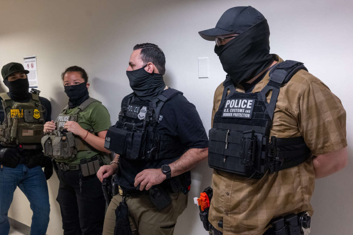 Federal agents patrol the halls of immigration court at the Jacob K. Javitz Federal Building on August 5, 2025, in New York City.