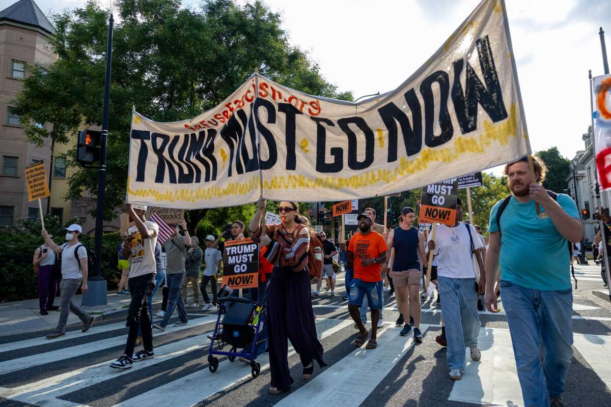 Protesters gather at Dupont Circle after the morning press conference by President Trump on August 11, 2025, in Washington, D.C.