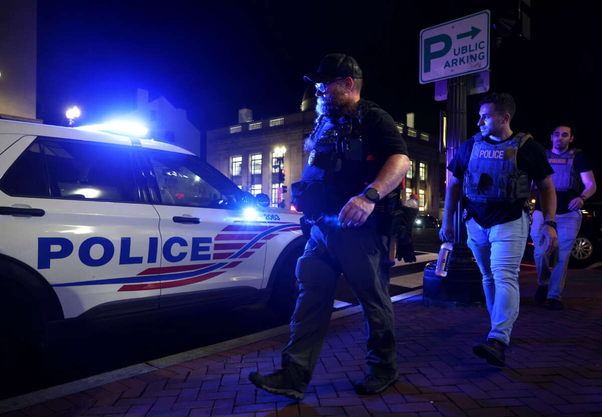 Members of DEA patrol on M Street in Georgetown on August 13, 2025, in Washington, D.C.