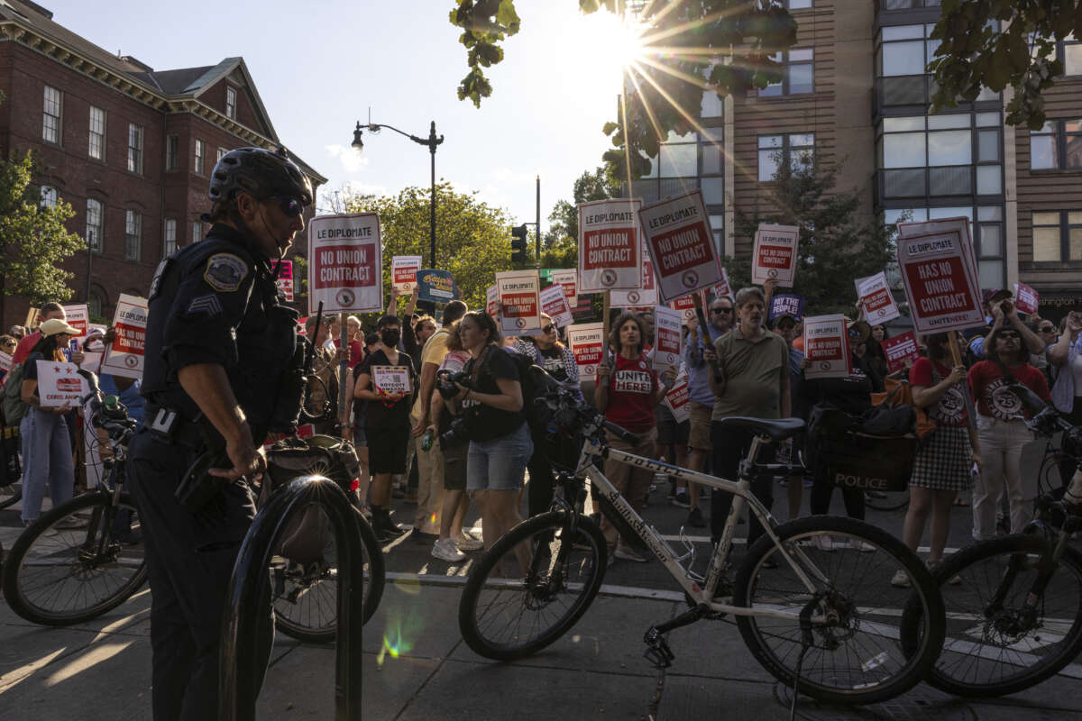 Activists march from Dupont Circle during the "Solidarity Season: Labor Day 2025 Rally and March," on August 28, 2025, in Washington, D.C.