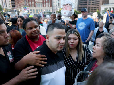 Kilmar Abrego Garcia and his wife Jennifer Vasquez Sura enter a U.S. Immigration and Customs Enforcement (ICE) field office on August 25, 2025 in Baltimore, Maryland.