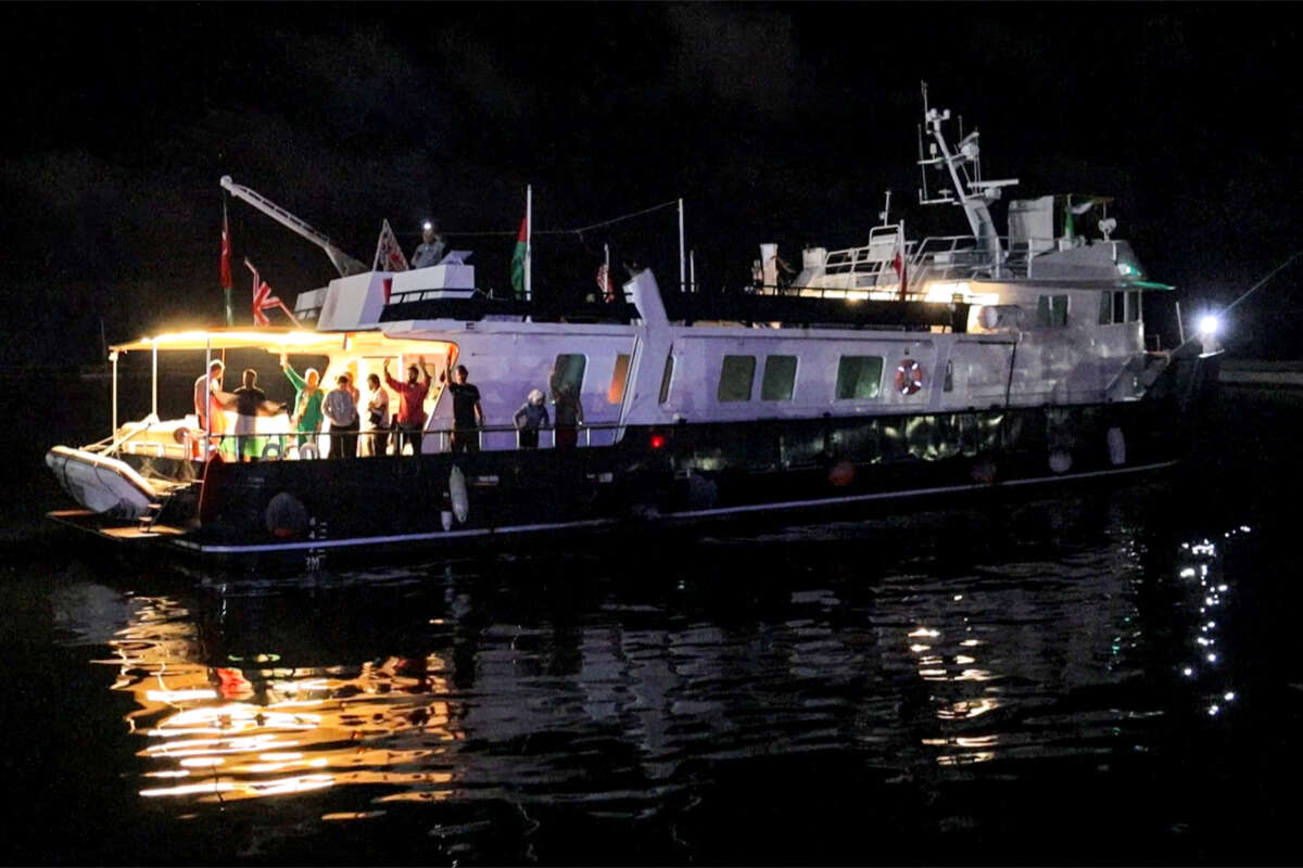 This grab from AFPTV footage shows activists riding aboard the British-flagged yacht Alma, which is part of the international flotilla for Gaza.