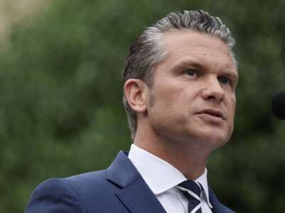 Secretary of Defense Pete Hegseth speaks during a September 11th observance event in the courtyard of the Pentagon September 11, 2025 in Arlington, Virginia.