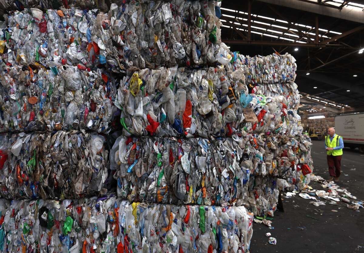 Bales of plastic containers sit stacked in a warehouse at Recology's Recycle Central on September 24, 2024, in San Francisco, California. California Attorney General Rob Bonta had filed a lawsuit against ExxonMobil, alleging the oil and gas corporation misled consumers by telling them that recycling was a viable solution for plastic waste.