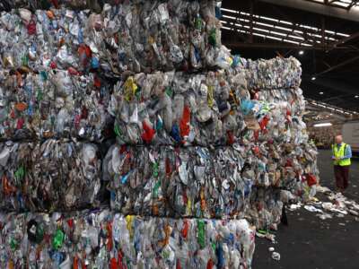 Bales of plastic containers sit stacked in a warehouse at Recology's Recycle Central on September 24, 2024, in San Francisco, California. California Attorney General Rob Bonta had filed a lawsuit against ExxonMobil, alleging the oil and gas corporation misled consumers by telling them that recycling was a viable solution for plastic waste.