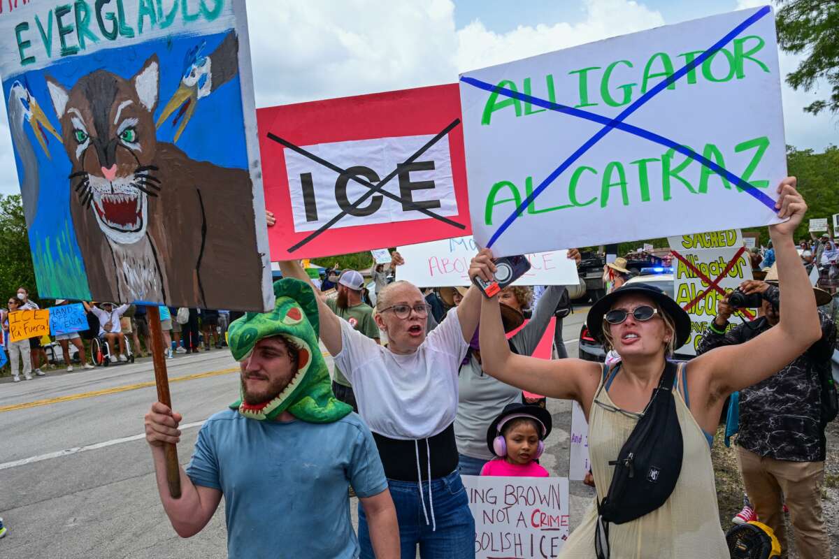 Demonstrators protest the construction of the immigrant detention center dubbed "Alligator Alcatraz" in the Everglades near Ochopee, Florida, on June 28, 2025.