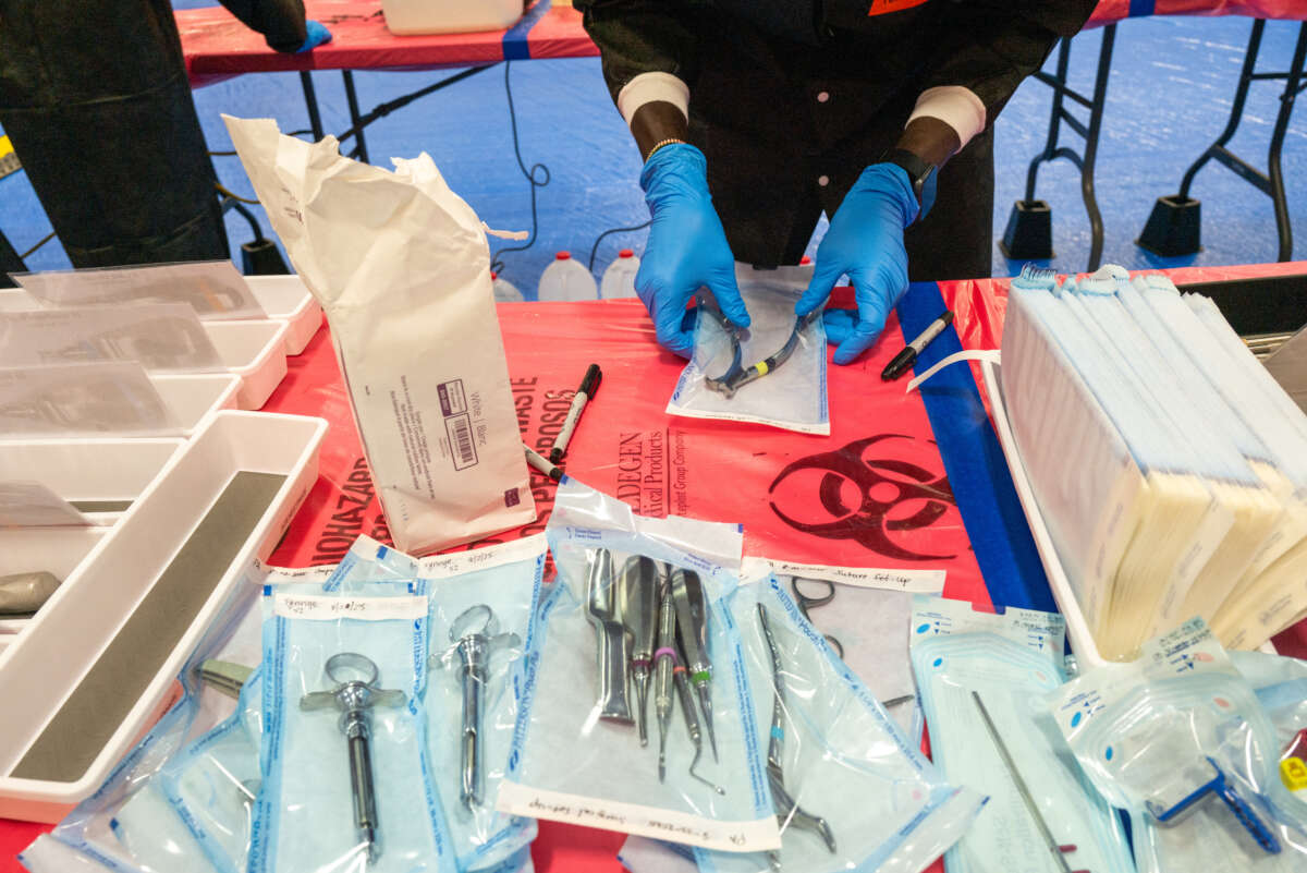 Medical students volunteer at a Remote Area Medical (RAM) mobile dental and medical clinic on August 2, 2025, in Terre Haute, Indiana.