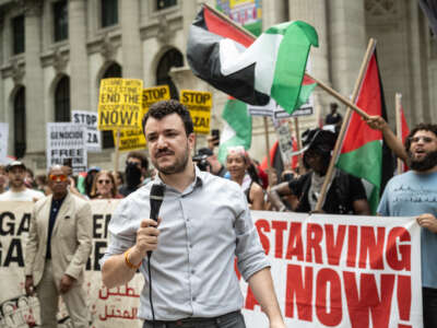 Mahmoud Khalil, former Columbia University graduate student known for his role in the 2024 Columbia University pro-Palestinian protests, speaks at a Pro-Palestinian "March for Humanity" rally against the humanitarian crisis in Gaza on August 16, 2025, in New York City.