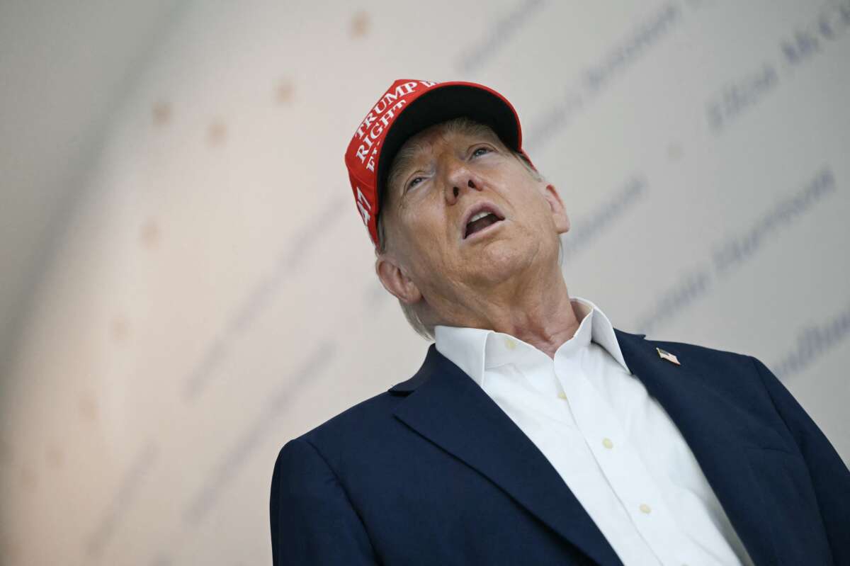 Donald Trump speaks at "The People's House," a White House immersive experience across the street from the Eisenhower Executive Office Building, during a tour on August 22, 2025, in Washington, D.C.