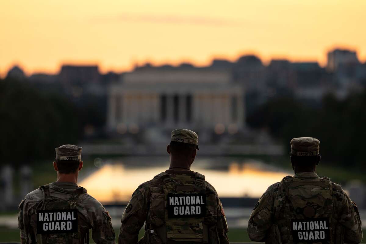Members of the National Guard are seen standing near the Washington Monument, on September 2, 2025, in Washington, D.C.