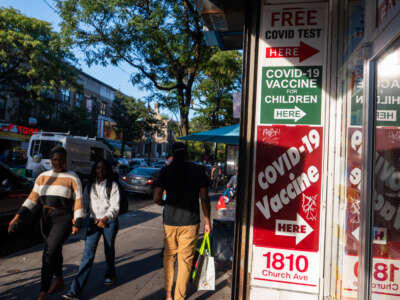 A pharmacy advertises COVID-19 testing and a vaccine on September 4, 2025, in Brooklyn, New York.