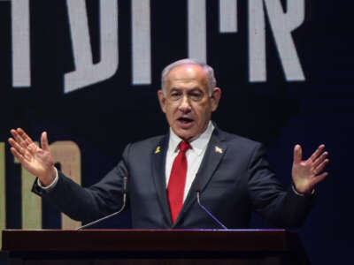 Israeli Prime Minister Benjamin Netanyahu delivers a speech during a signing ceremony for a framework agreement, aiming to speed up development in the Israeli settlement of Maale Adumim, in the occupied-West Bank settlement on September 11, 2025.