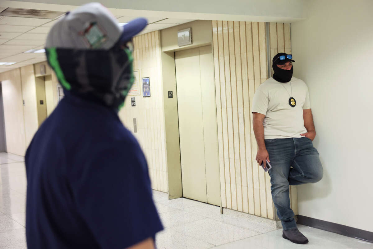 Federal agents patrol the halls of immigration court at the Jacob K. Javits Federal Building on September 8, 2025, in New York City.