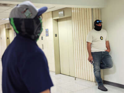 Federal agents patrol the halls of immigration court at the Jacob K. Javits Federal Building on September 8, 2025, in New York City.