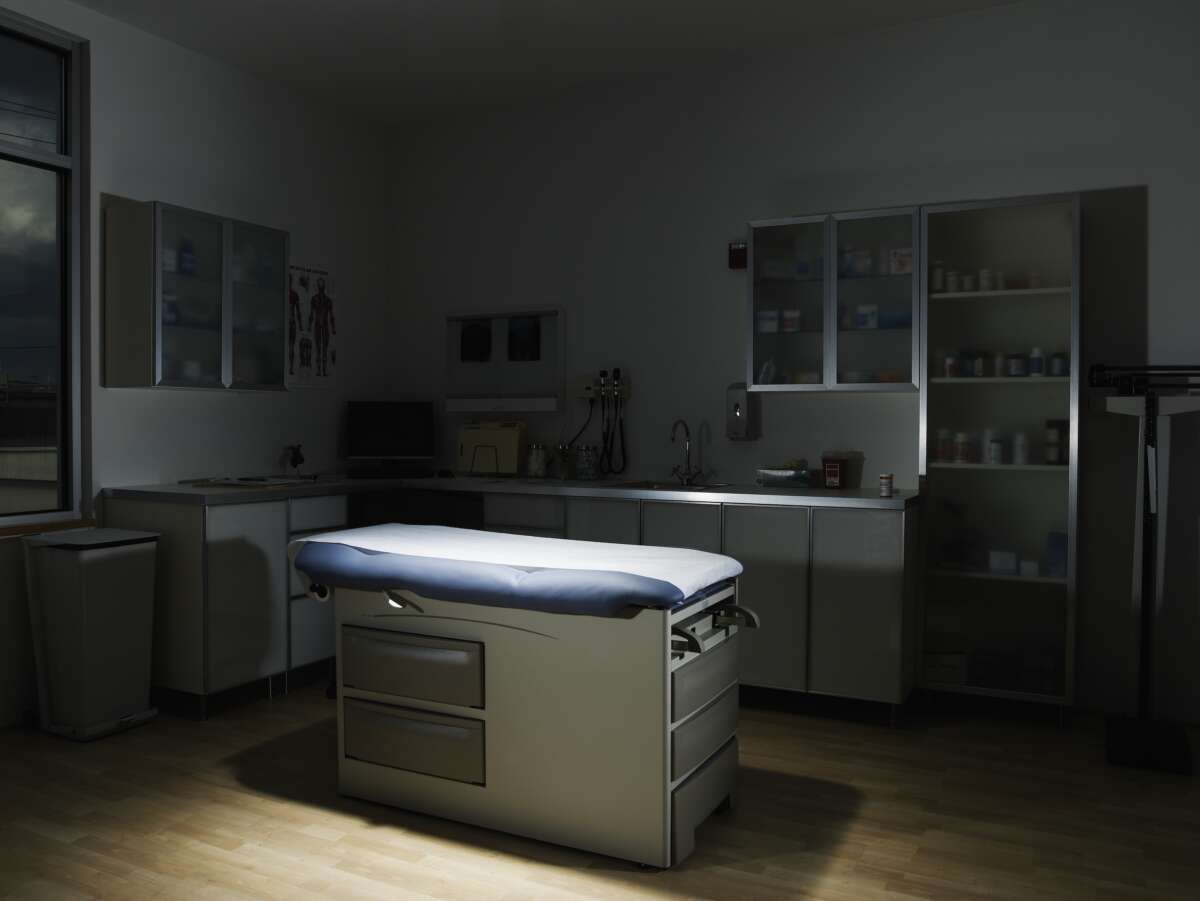 Empty examination room with spotlight