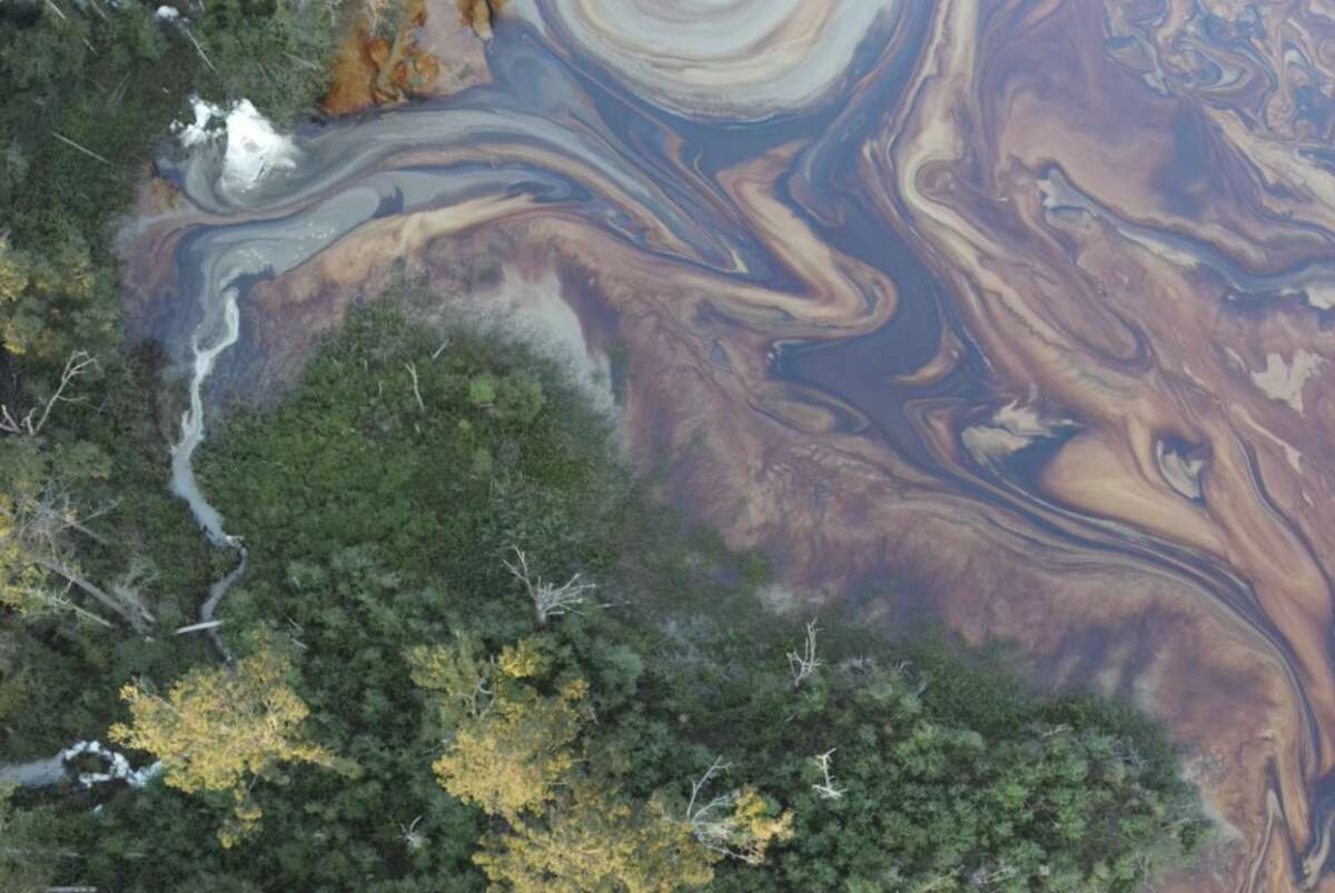 Oil and chemical slicks are seen in waterways near Roseland, Louisiana in the days after a Smitty’s Supply facility exploded in the town on August 22, 2025.