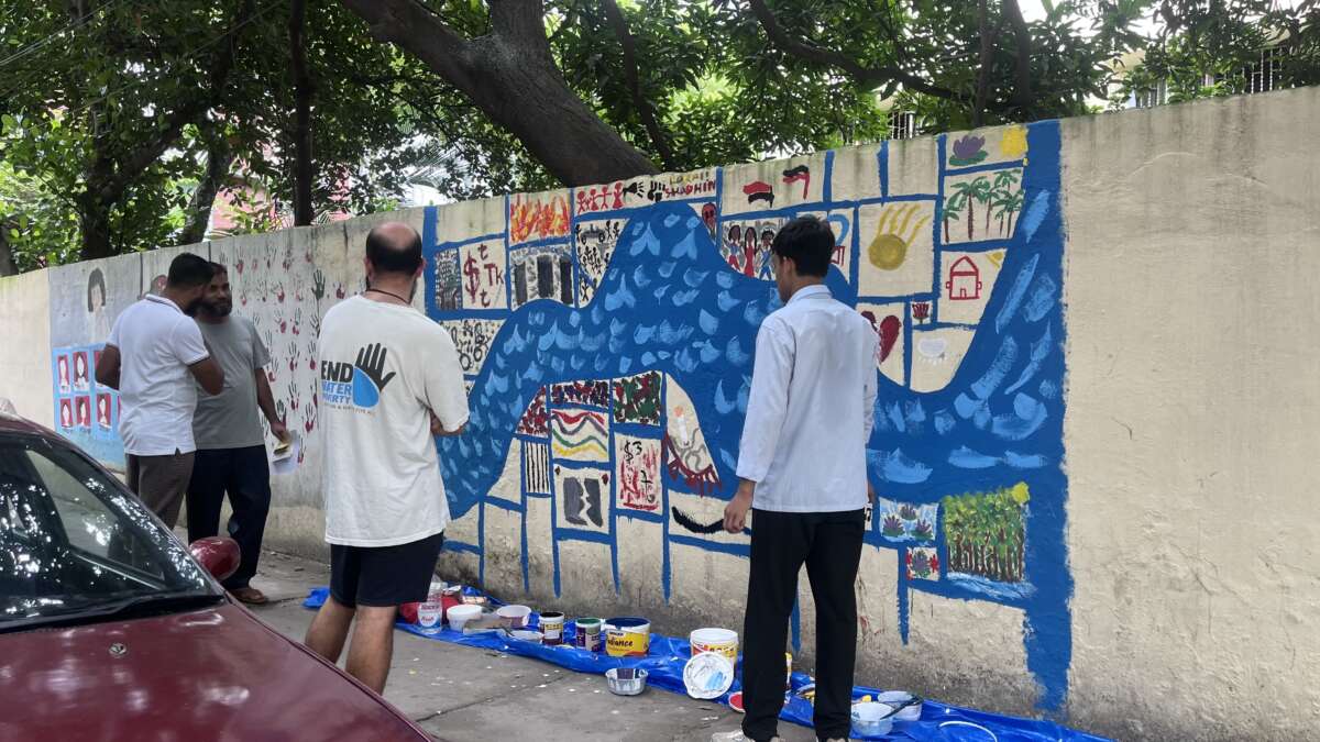 Activists and artists paint a mural of their emotions and experiences since the uprisings, in August 2025, in Dhaka, the capital of Bangladesh.
