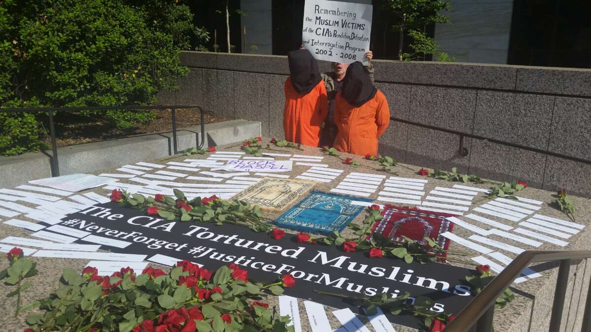 A demonstration takes place outside the Hart Building in Washington, D.C., in May 2018 during the confirmation hearing of former CIA director Gina Haspel.