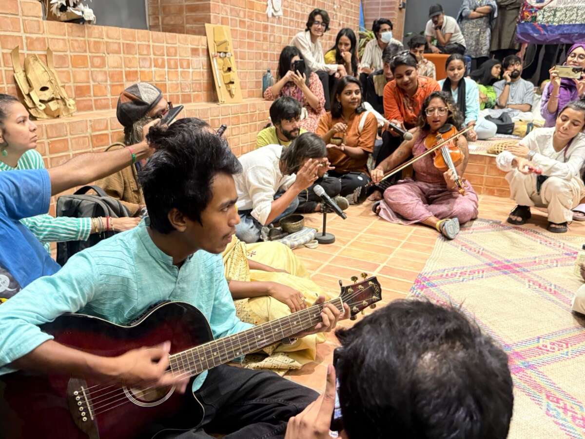Musicians and participants jam about freedom in Bangladesh at a gallery opening in Dhaka in August 2025.