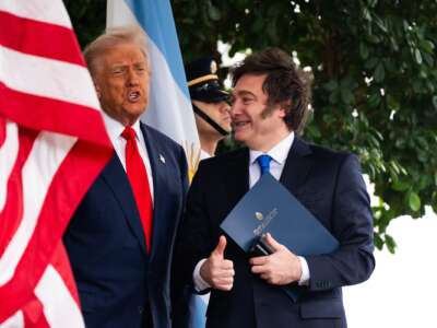 U.S. President Donald Trump greets President of Argentina Javier Milei as he arrives at the West Wing of the White House on Tuesday October 14, 2025.