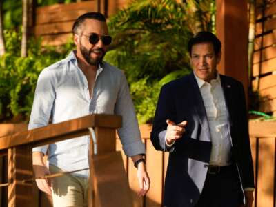 U.S. Secretary of State Marco Rubio (R) meets with El Salvador's President Nayib Bukele at his residence at Lake Coatepeque in El Congo municipality, El Salvador, on February 3, 2025.