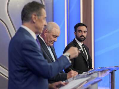 Former New York Gov. Andrew Cuomo (L), Republican nominee Curtis Sliwa, and Democratic nominee Zohran Mamdani participate in a mayoral debate at Rockefeller Center on October 16, 2025 in New York City.
