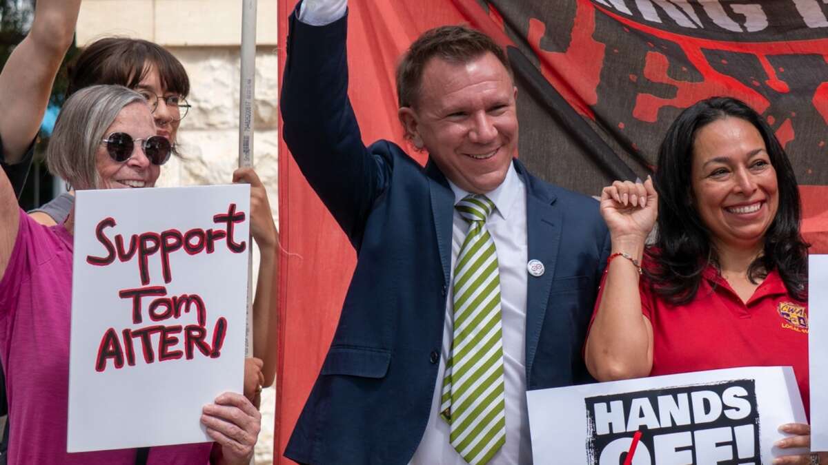 Tom Alter with his supporters at a press conference and rally in September.