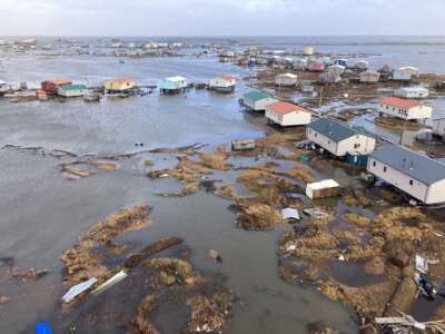 The village of Kipnuk, largely submerged by the remnants of Typhoon Halong, is seen from the air on October 12, 2025.