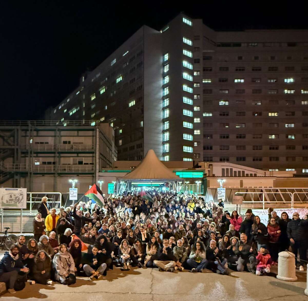 Medics and hospital workers striking and posing in fron of “Ospedale Maggiore” hospital in Bologna on October 3.