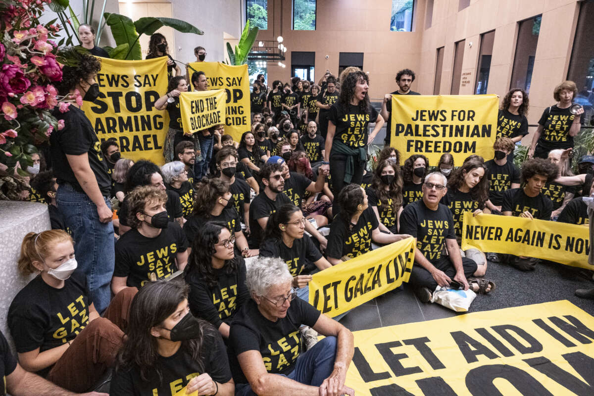 Protesters with Jewish Voice for Peace (JVP) occupy the offices of New York Senators Kirsten Gillibrand and Chuck Schumer to denounce their votes against halting arms shipments to Israel, on August 1, 2025, in New York City.