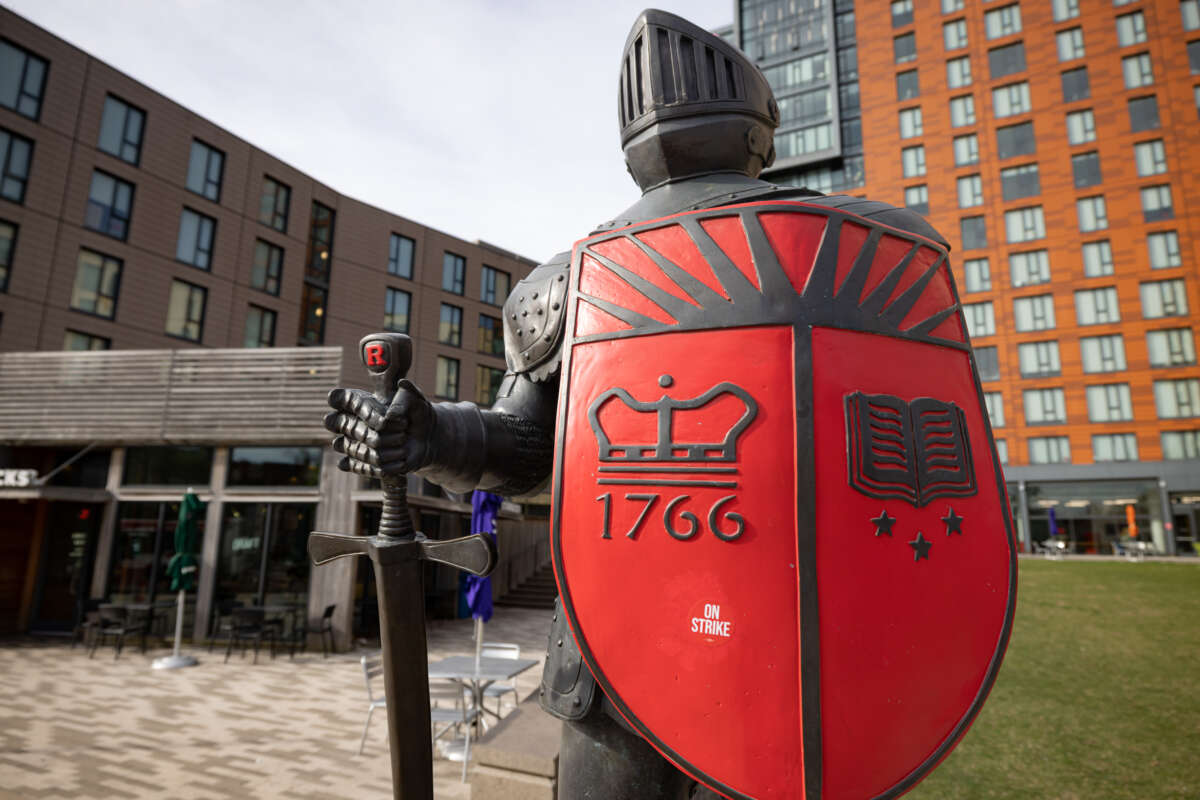 A statue of the Rutgers University mascot with an "On Strike" sticker at the university's main campus in New Brunswick, NJ, as seen on April 12, 2023.