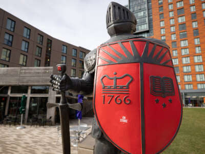 A statue of the Rutgers University mascot with an "On Strike" sticker at the university's main campus in New Brunswick, NJ, as seen on April 12, 2023.