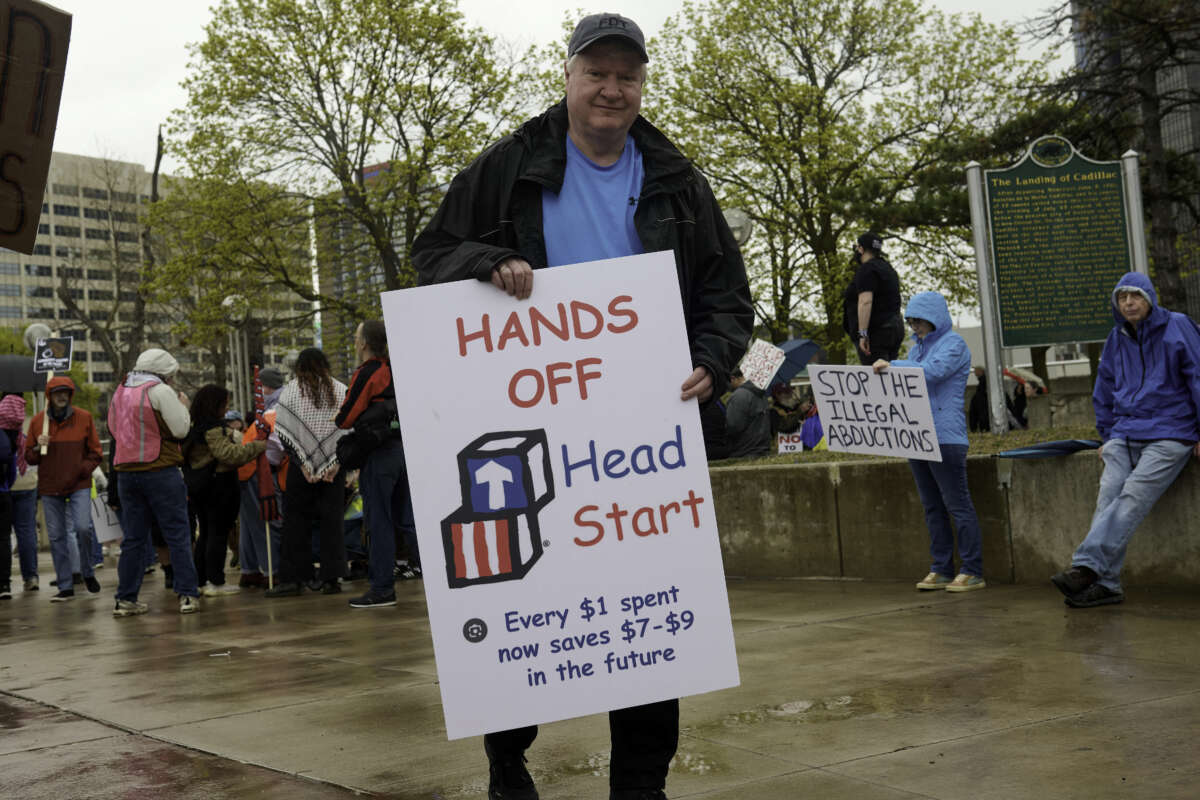 People gather to protest the Trump administration at Hart Plaza in downtown Detroit, Michigan, on April 19, 2025.