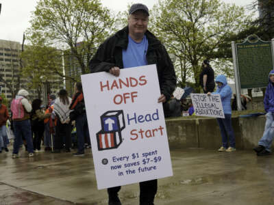 People gather to protest the Trump administration at Hart Plaza in downtown Detroit, Michigan, on April 19, 2025.