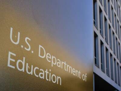 A sign marks the location of the U.S. Department of Education headquarters building on June 20, 2025, in Washington, D.C.