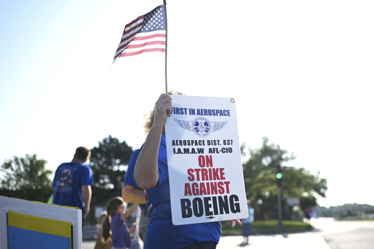 Workers strike outside of a Boeing facility in Berkeley, Missouri, on August 5, 2025.