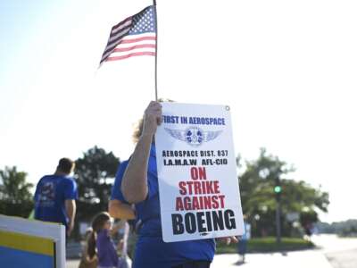 Workers strike outside of a Boeing facility in Berkeley, Missouri, on August 5, 2025.