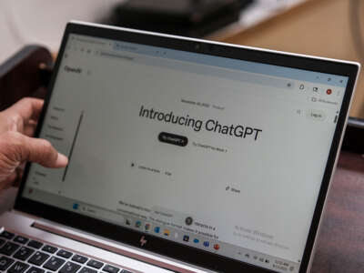 A computer screen displays the home screen of GhatGPT