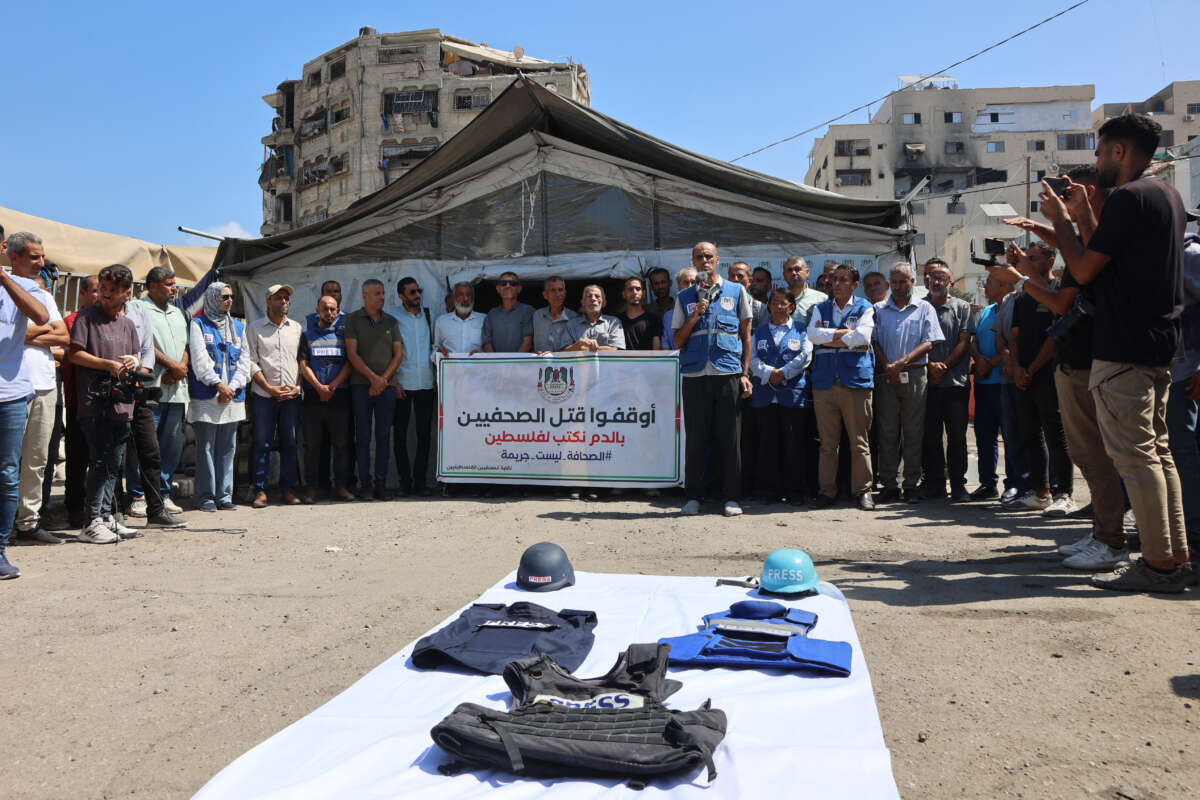 Demonstrators gather in solidarity with journalists killed by Israeli strikes in the Gaza Strip, during a protest organzed by the Gaza Journalists Syndicate, in Gaza City, on August 26, 2025.