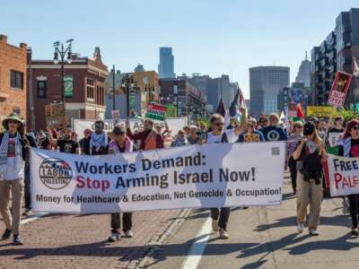 Labor for Palestine protests Israel's genocide in Gaza as part of Detroit's Labor Day parade on September 1, 2025.