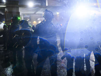 Anti-I.C.E. protesters clash with federal agents at the U.S. Immigration and Customs Enforcement building on October 18, 2025, in Portland, Oregon.