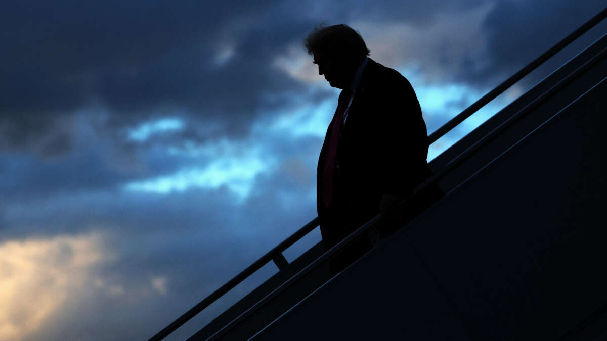 President Donald Trump walks down the steps of Air Force One after he landed at West Palm Beach International Airport on October 17, 2025, in West Palm Beach, Florida.