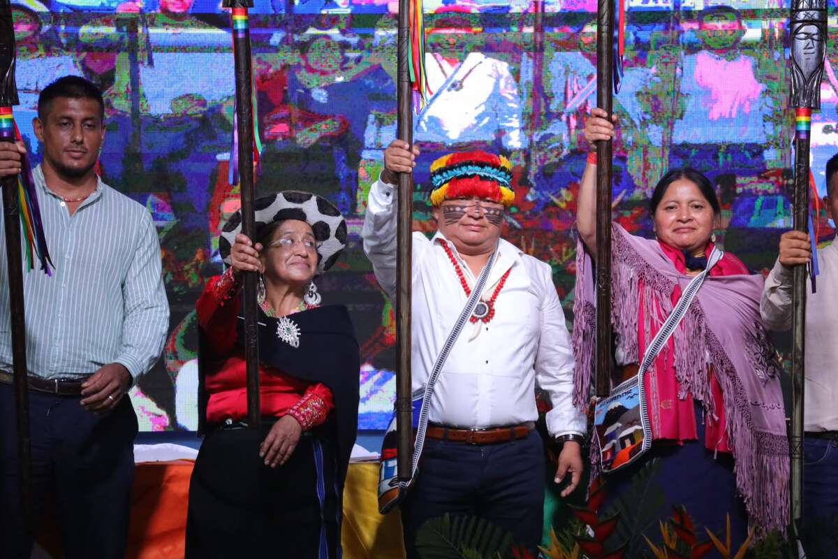 CONAIE’S new president, Marlon Vargas, holds a symbolic spear on stage during his inauguration in the Amazonian city of Puyo, Pastaza, Ecuador, on August 9, 2025.