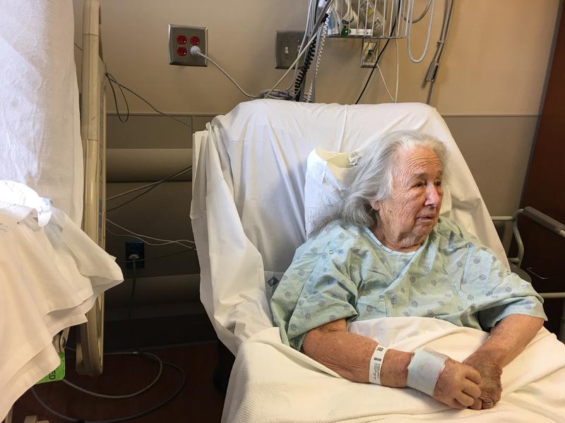 Lewis Raven Wallace's grandmother, Sarah Graydon McCrory, sits in a hospital bed. "I got to stand by her on her deathbed as she grappled with connection and liberation," Wallace writes.