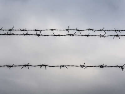 Barbed wire against sky.