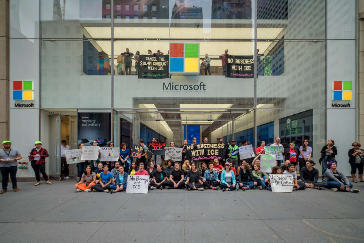 Anti-ICE protesters demonstrate at a Microsoft retail store in Manhattan, New York City, in an act of nonviolent civil disobedience on September 14, 2019.