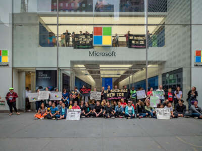 Anti-ICE protesters demonstrate at a Microsoft retail store in Manhattan, New York City, in an act of nonviolent civil disobedience on September 14, 2019.